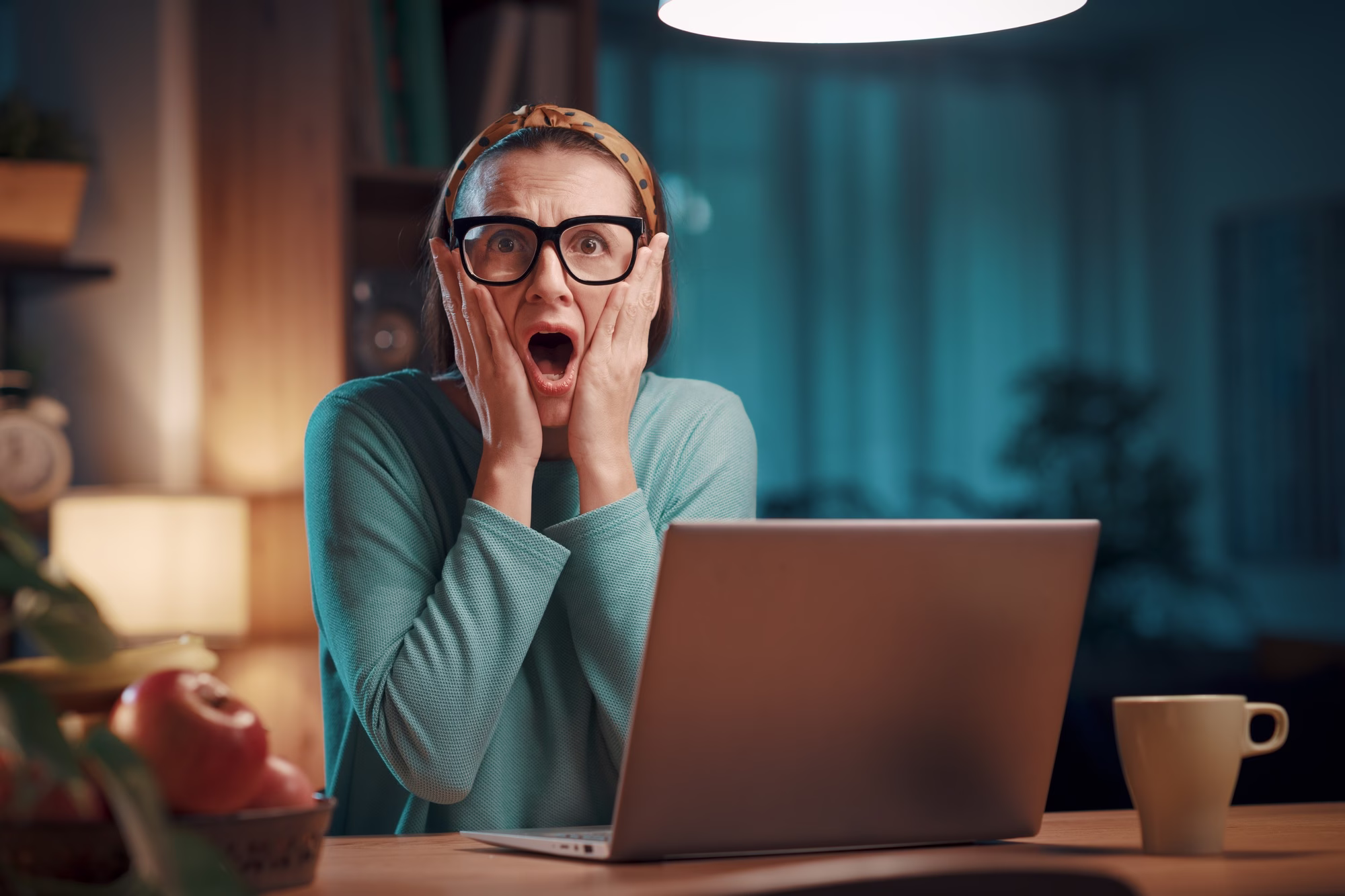 Stressed woman having problems with her laptop