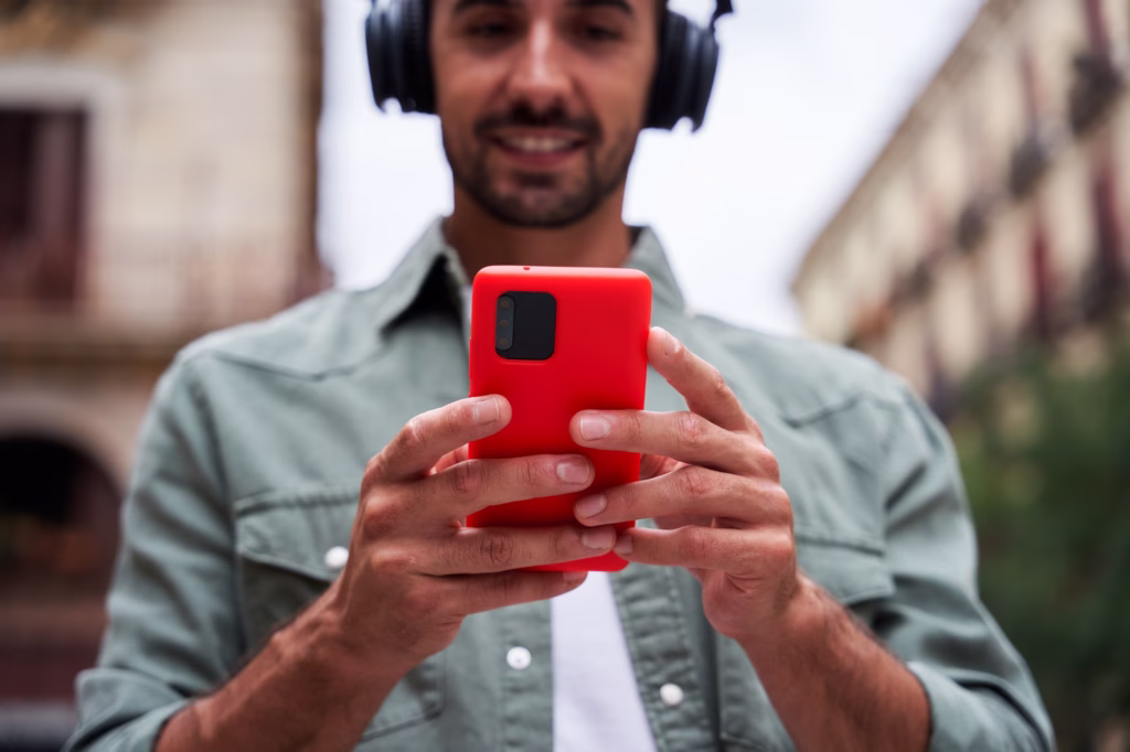 Instagram seo - Close up of a caucasian man using telephone to be connected on social media.